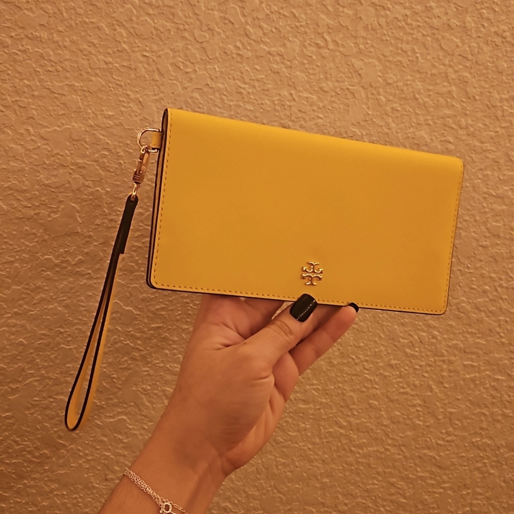 Tory Burch Lemon Yellow Clutch Wallet with removable wrist strap.